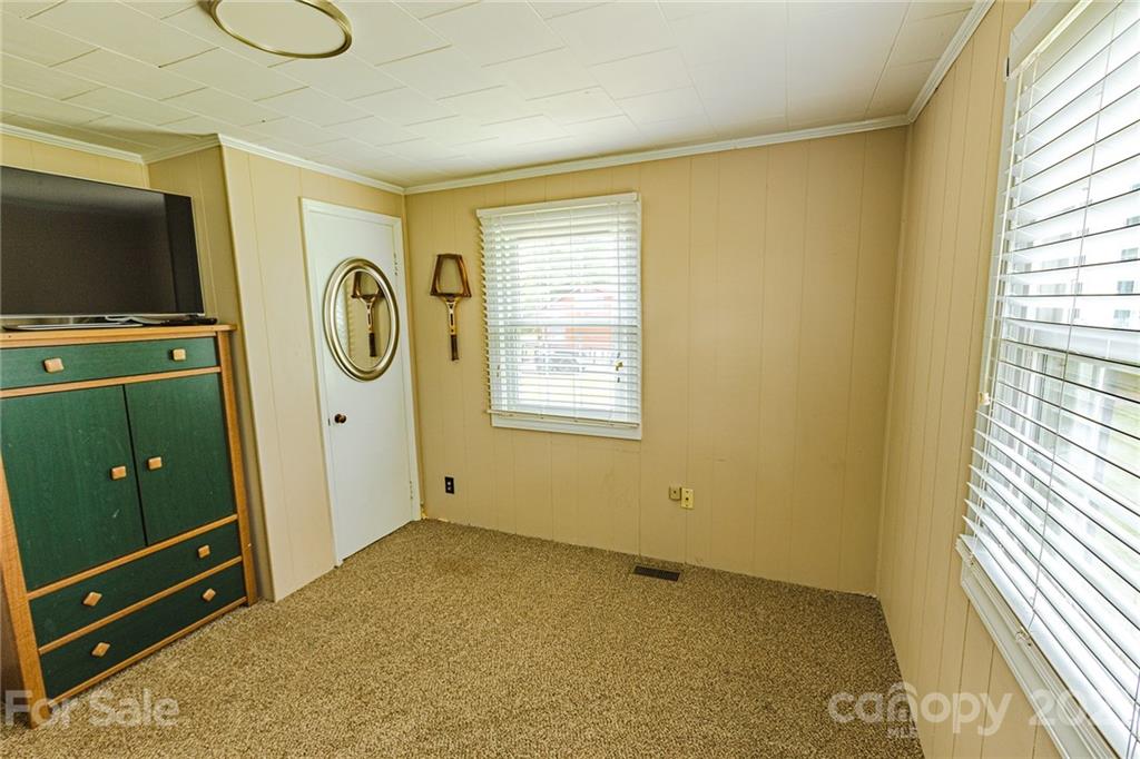 110 Edwards Road Mooresville, NC 28115 - Photo 3 of 39 a view of a livingroom with furniture and windows