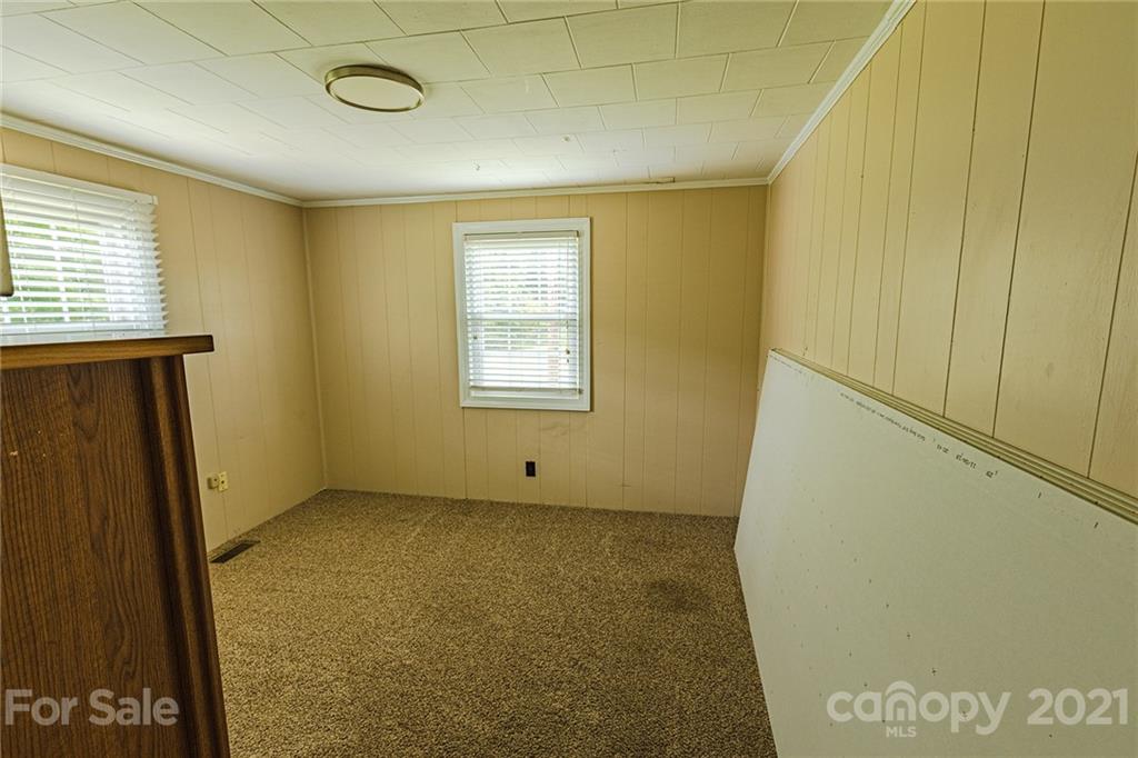 110 Edwards Road Mooresville, NC 28115 - Photo 4 of 39 a view of an empty room with a window