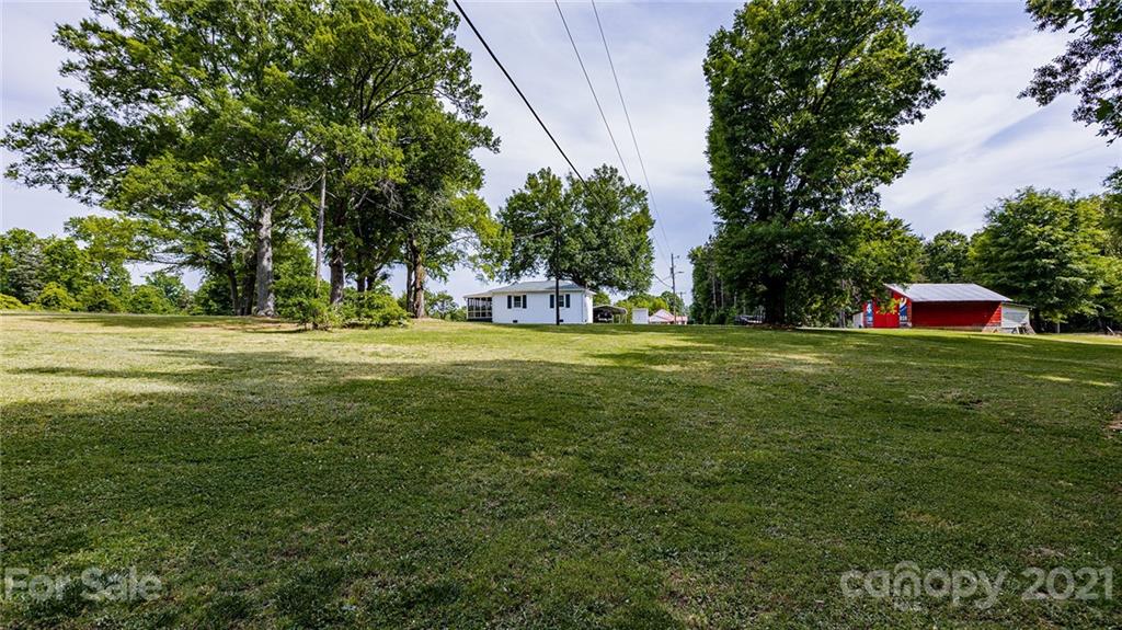 110 Edwards Road Mooresville, NC 28115 - Photo 32 of 39 a view of a trees with a big yard