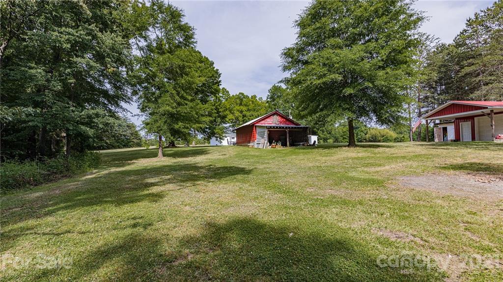 110 Edwards Road Mooresville, NC 28115 - Photo 38 of 39 a view of a house with a yard