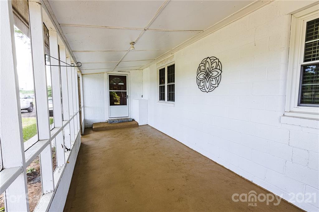 110 Edwards Road Mooresville, NC 28115 - Photo 7 of 39 a view of a hallway with window