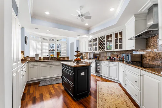 a kitchen with a stove and a refrigerator