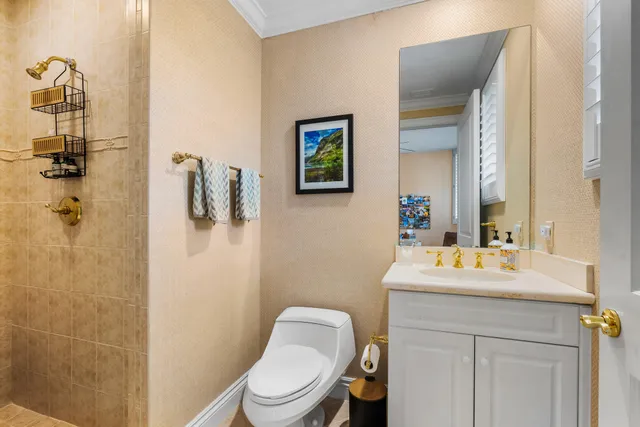 a bedroom with a bed and a tv on table