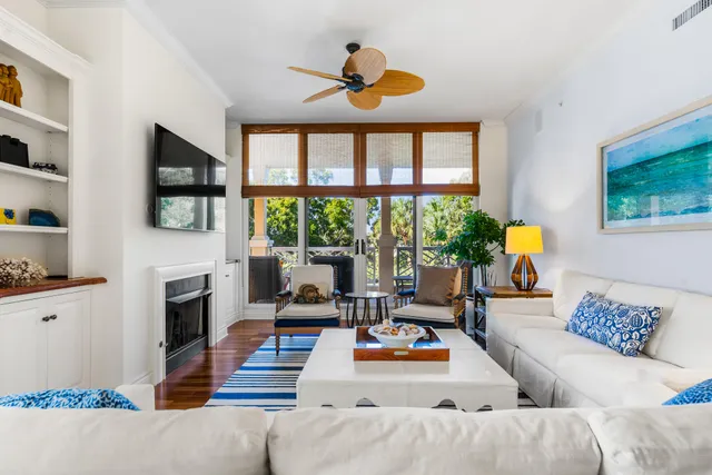 a living room with furniture and a rug