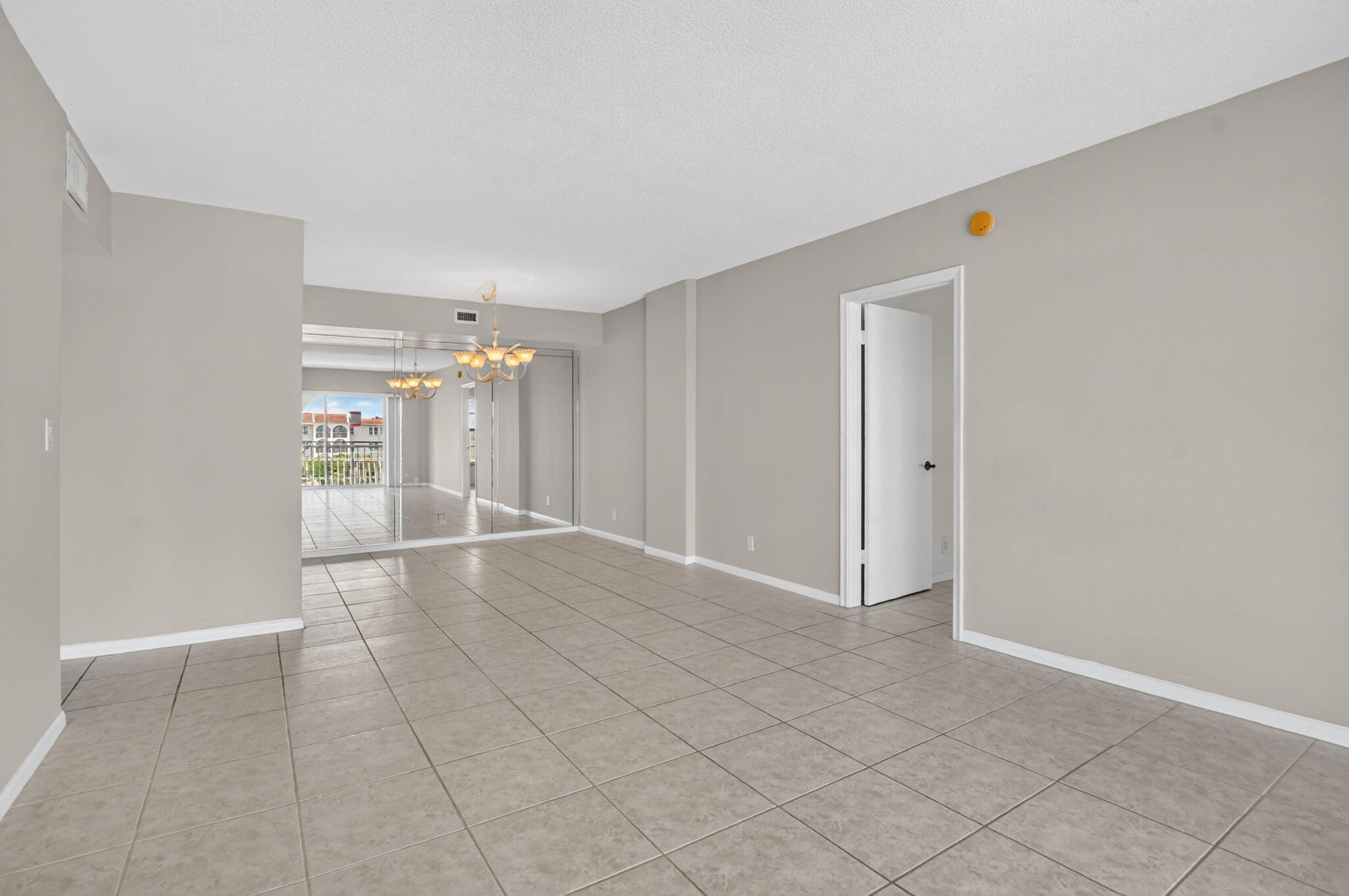 250 Northeast 20th Street, Unit 5220 Boca Raton, FL 33431 - Photo 11 of 40 a view of an empty room with window
