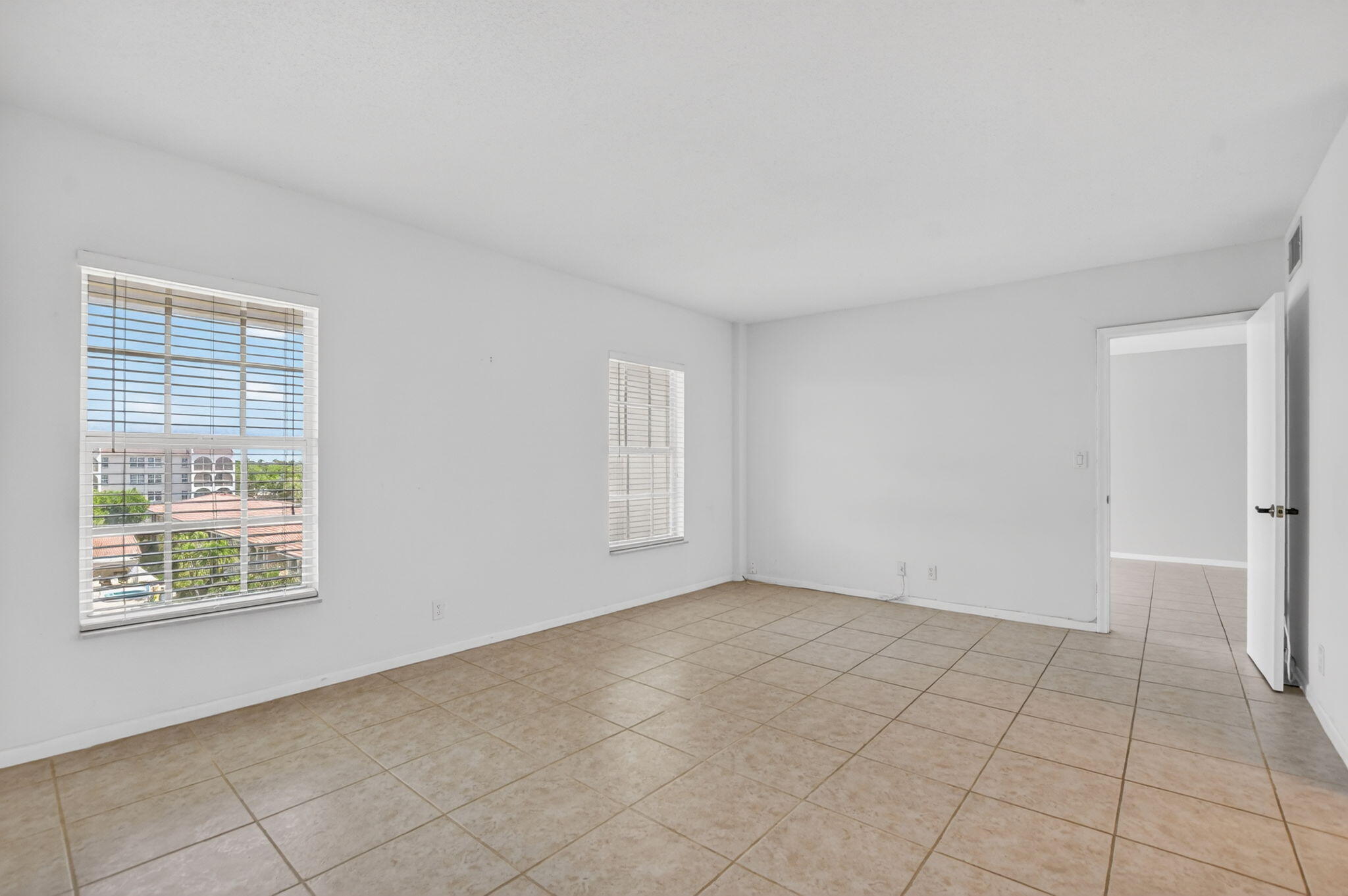 250 Northeast 20th Street, Unit 5220 Boca Raton, FL 33431 - Photo 16 of 40 a view of an empty room with a window