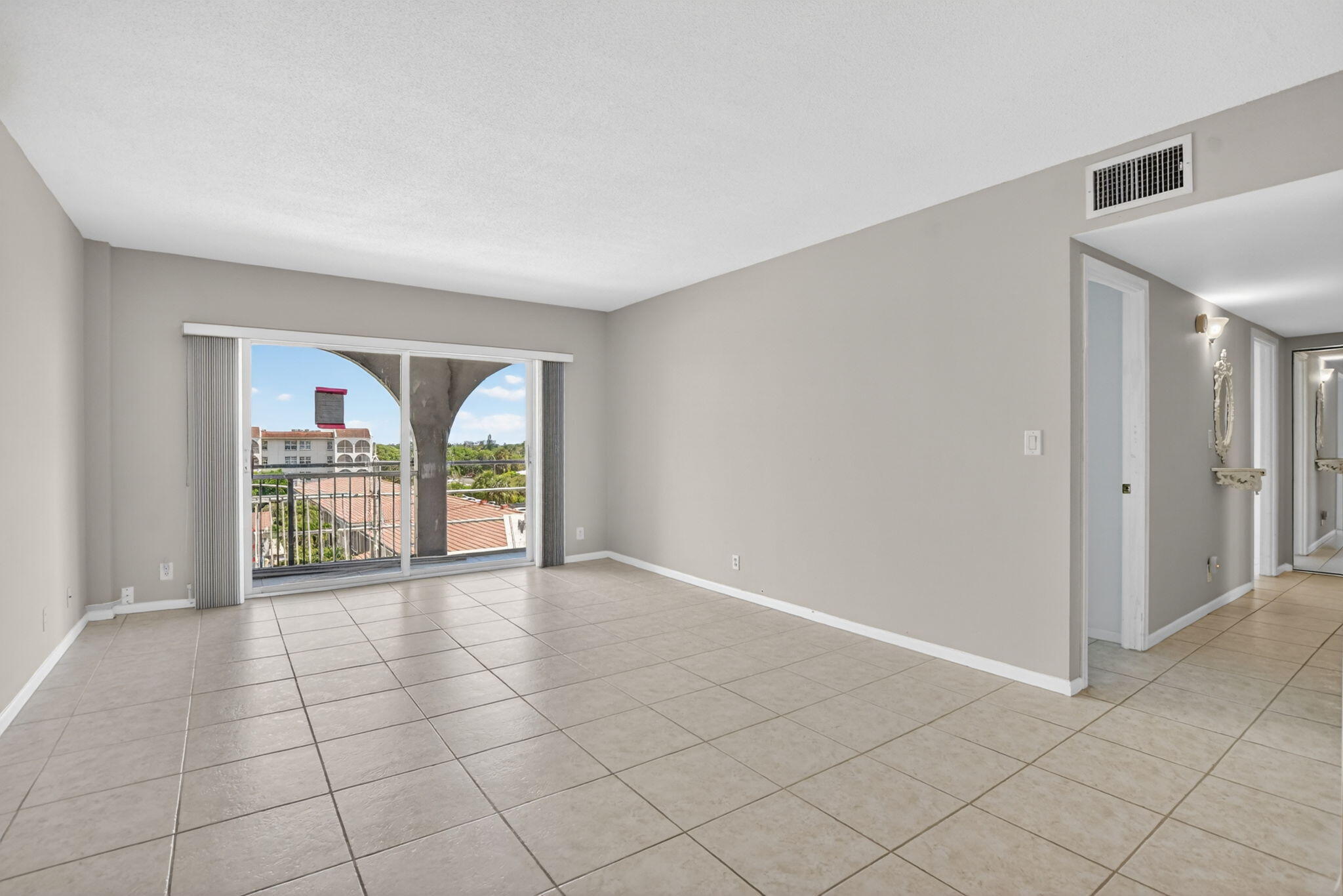 250 Northeast 20th Street, Unit 5220 Boca Raton, FL 33431 - Photo 8 of 40 a view of an empty room with a window