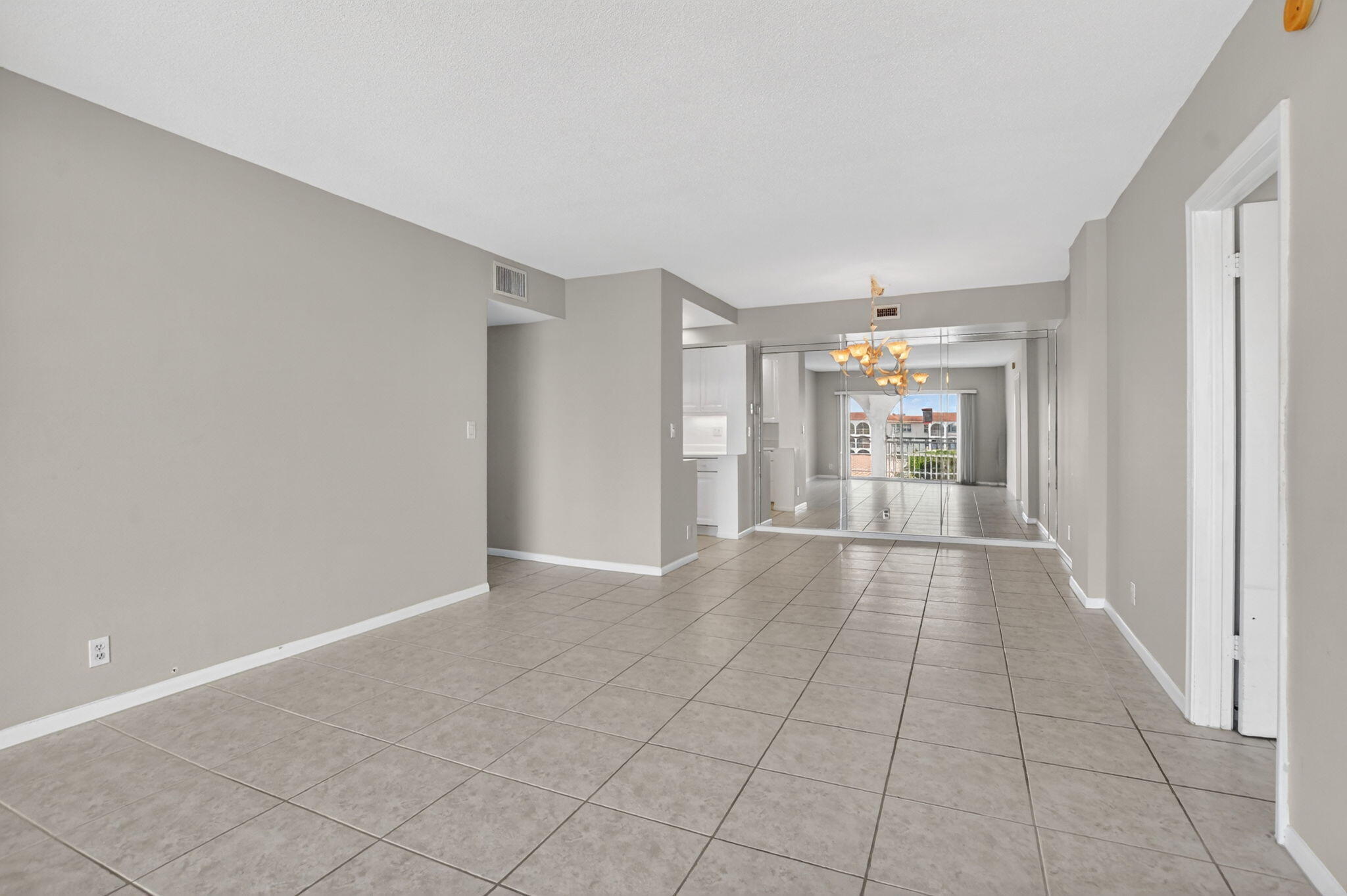 250 Northeast 20th Street, Unit 5220 Boca Raton, FL 33431 - Photo 10 of 40 a view of an empty room with a window