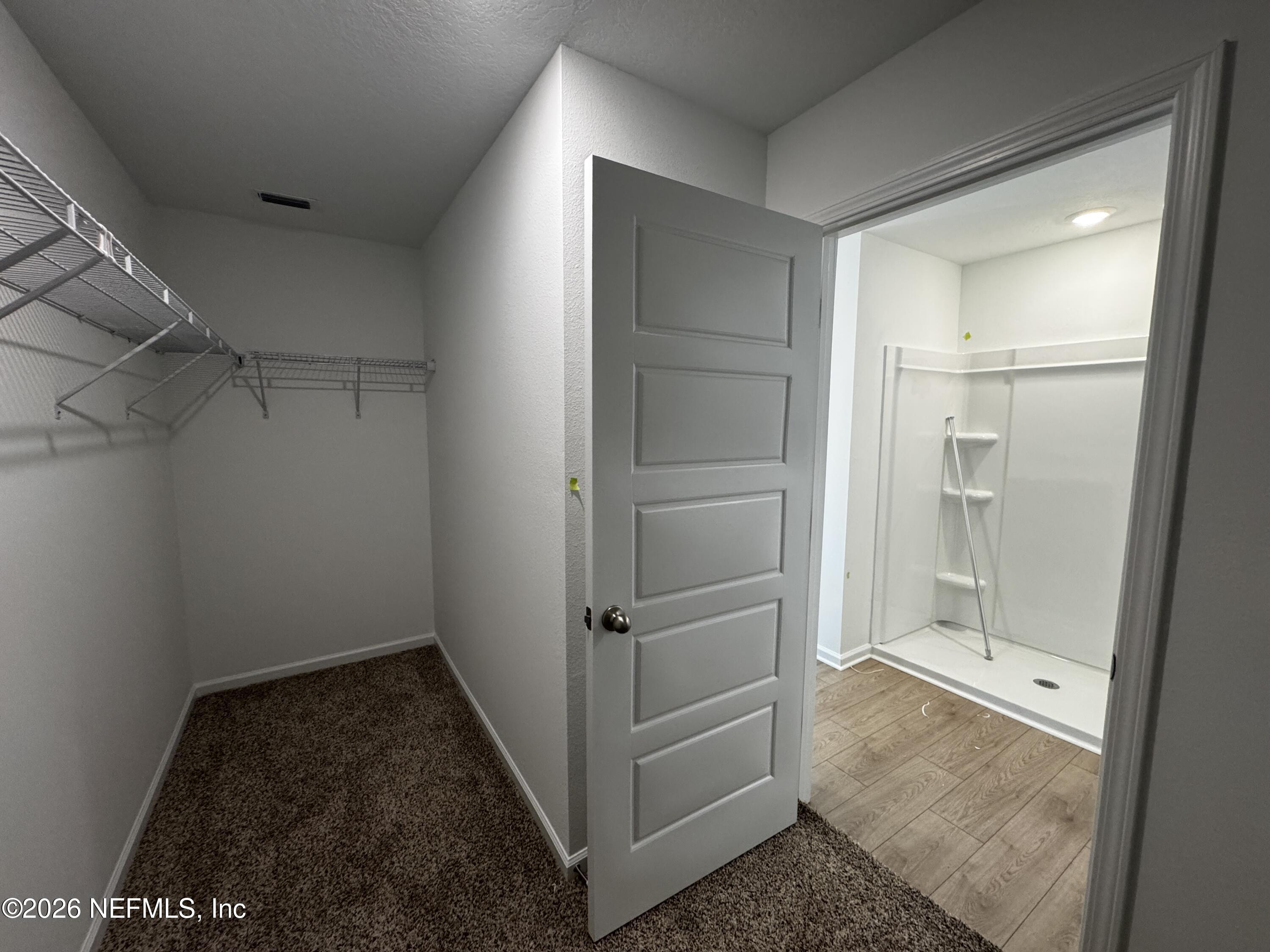 12390 Great Eagle Road Jacksonville, FL 32219 - Photo 21 of 69 a view of a room with rack on the wall