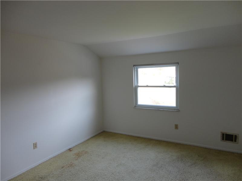 1012 Sundance Drive McKees Rocks, PA 15136 - Photo 14 of 15 Bedroom. Another large bedroom facing the rear of the house it does need new carpeting.