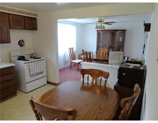 Dining Room. Seperate dining room & small eat in area in the kitchen.