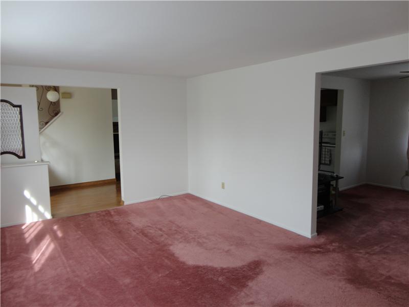 1012 Sundance Drive McKees Rocks, PA 15136 - Photo 9 of 15 Living Room. Light bright house , carpeting needs changed but layout & room sizes are great.