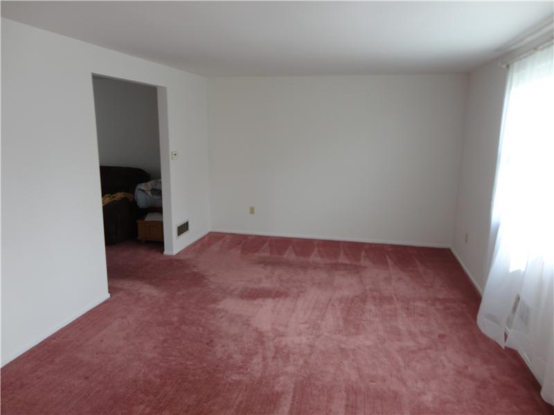 1012 Sundance Drive McKees Rocks, PA 15136 - Photo 10 of 15 Living Room. Other side of large living room entrance to dining room off to the right side