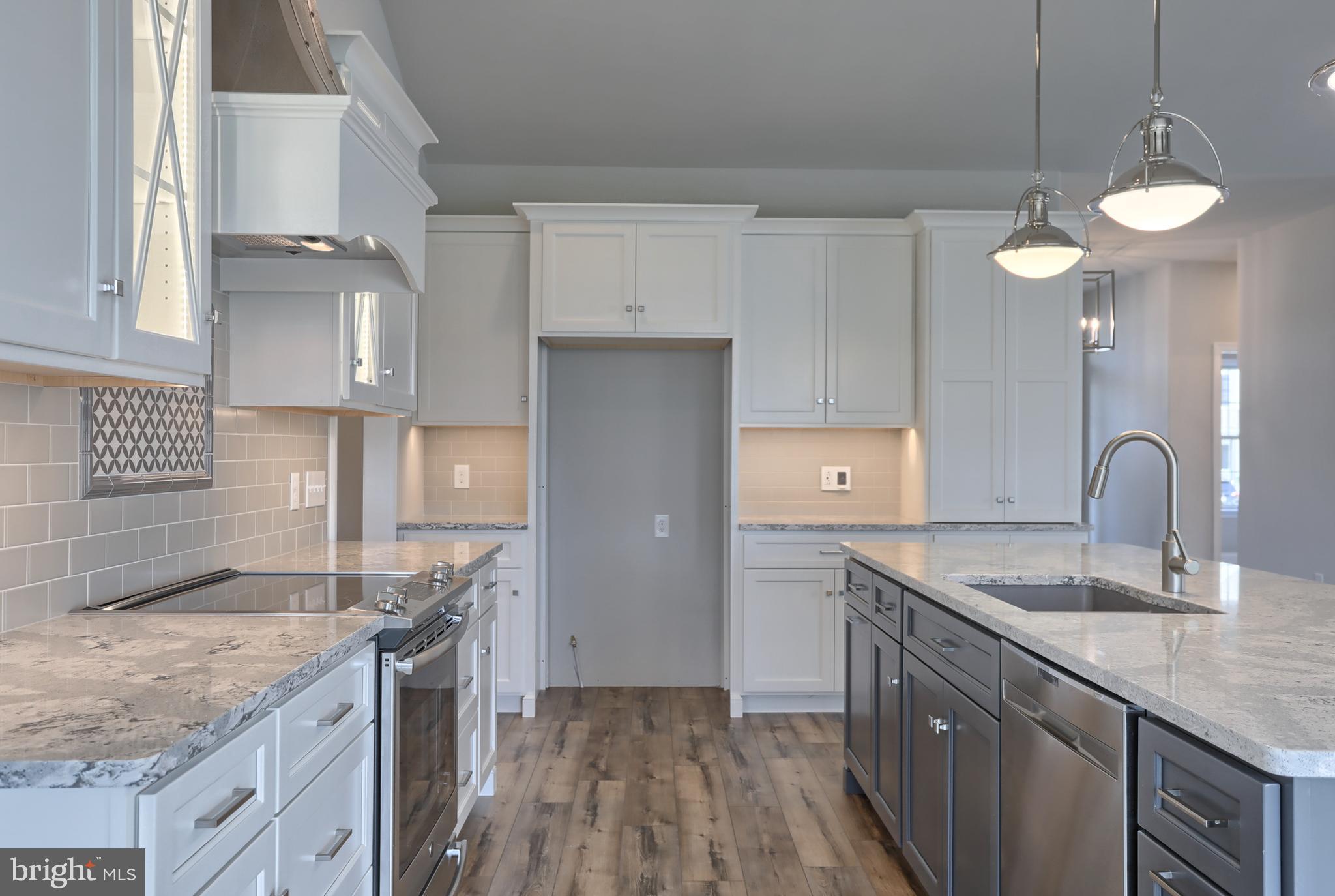 18 Rolling Meadow Road Lebanon, PA 17046 - Photo 18 of 35 a kitchen with granite countertop a sink cabinets and stainless steel appliances
