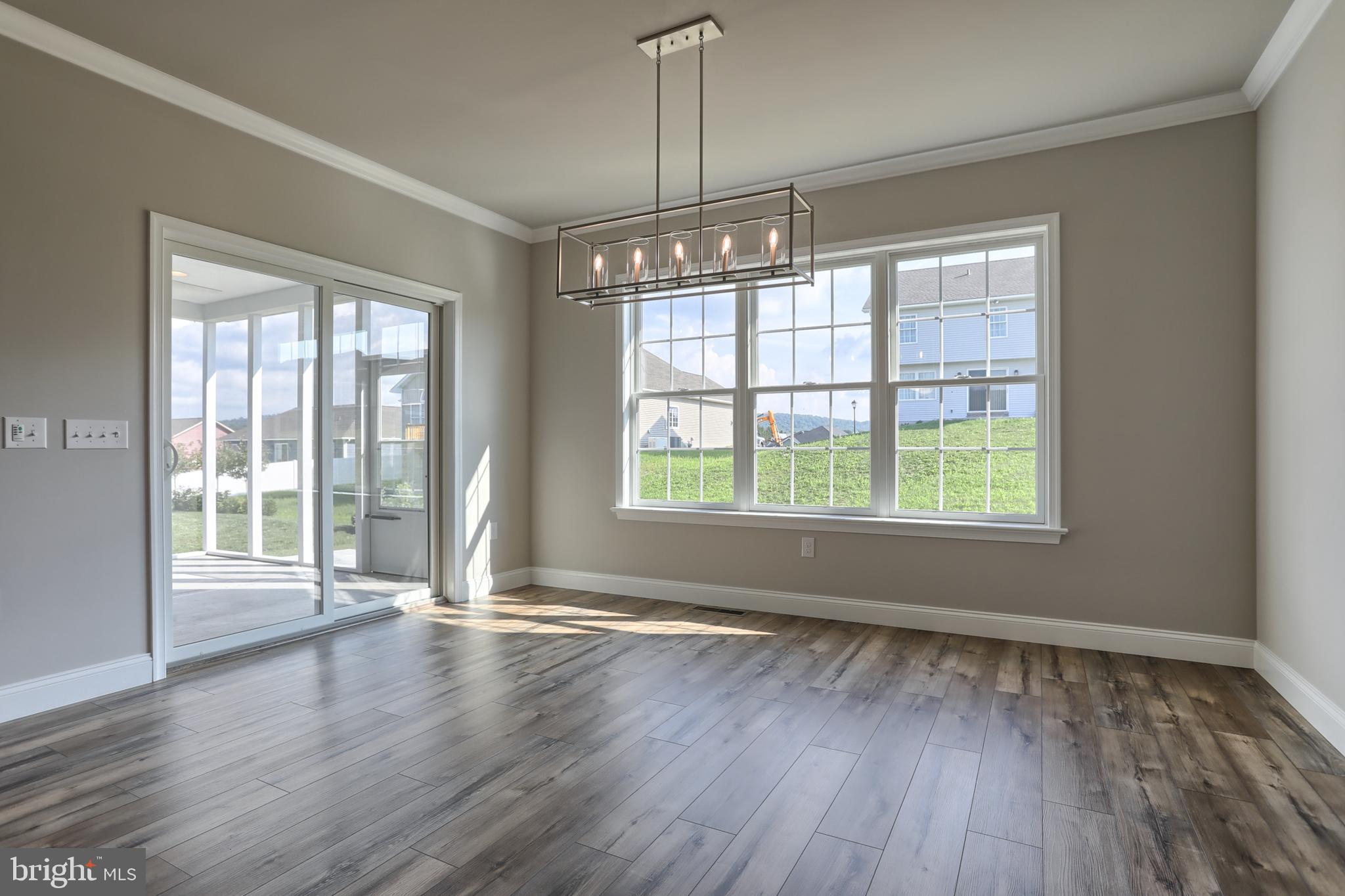 18 Rolling Meadow Road Lebanon, PA 17046 - Photo 21 of 35 a view of an empty room with wooden floor and a window