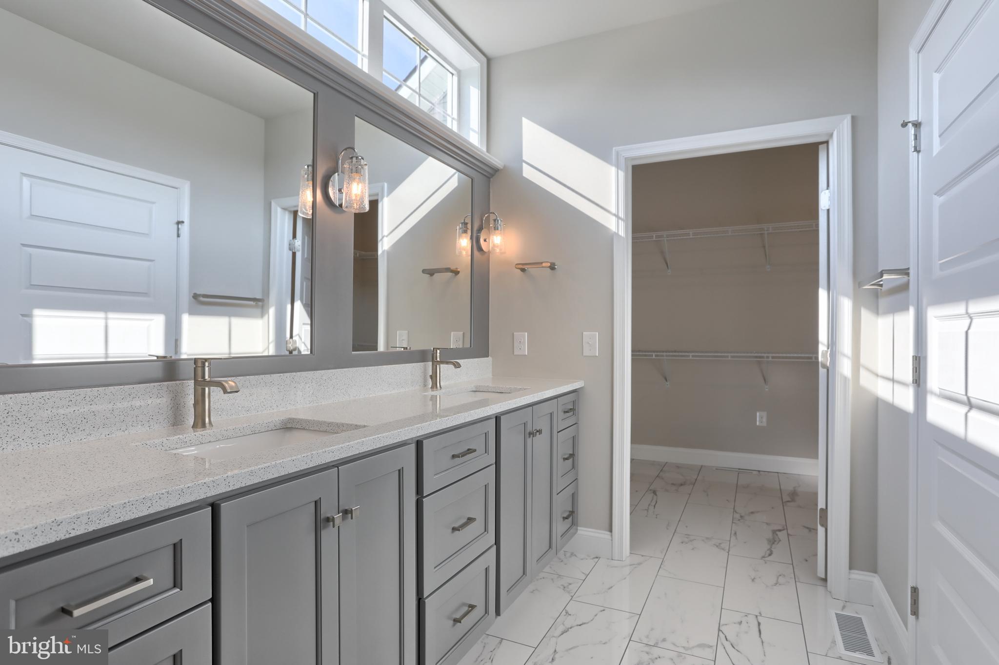 18 Rolling Meadow Road Lebanon, PA 17046 - Photo 27 of 35 a bathroom with a granite countertop sink two mirror and a shower