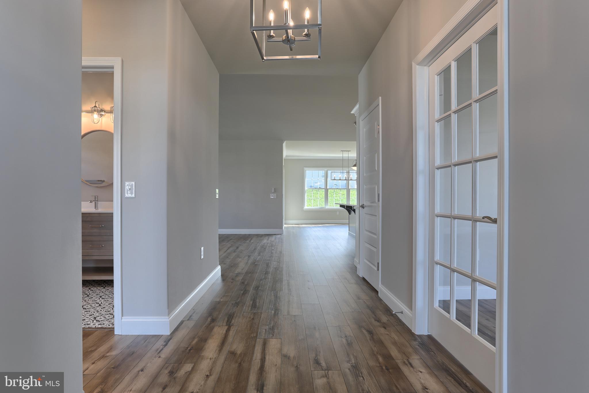 18 Rolling Meadow Road Lebanon, PA 17046 - Photo 3 of 35 a view of livingroom with hardwood floor and a kitchen view