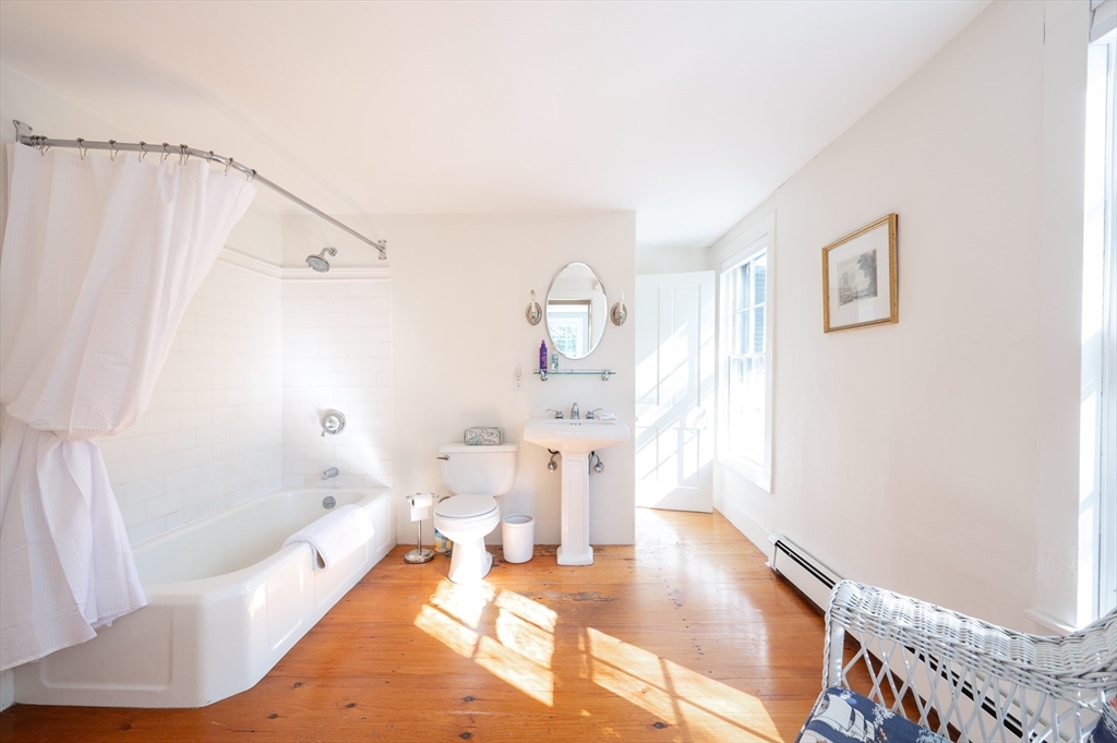 339 Boston Road Sutton, MA 01590 - Photo 19 of 28 a living room with furniture and a wooden floor