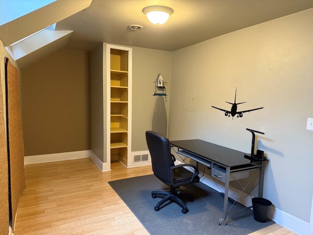 2035 Lyle Avenue, Unit A College Park, GA 30337 - Photo 8 of 12 a view of a workspace with furniture