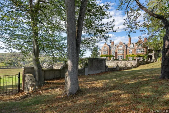 a swimming pool with wooden fence
