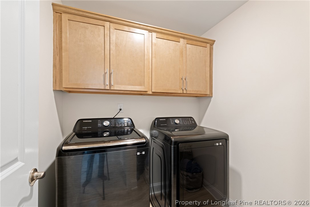 18 Two Belles Court Angier, NC 27501 - Photo 21 of 39 a utility room with dryer and washer