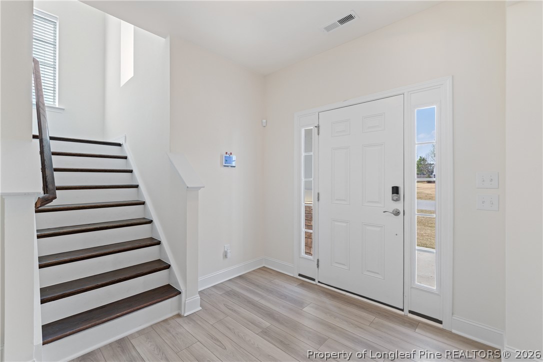 18 Two Belles Court Angier, NC 27501 - Photo 3 of 39 a view of a room with wooden floor