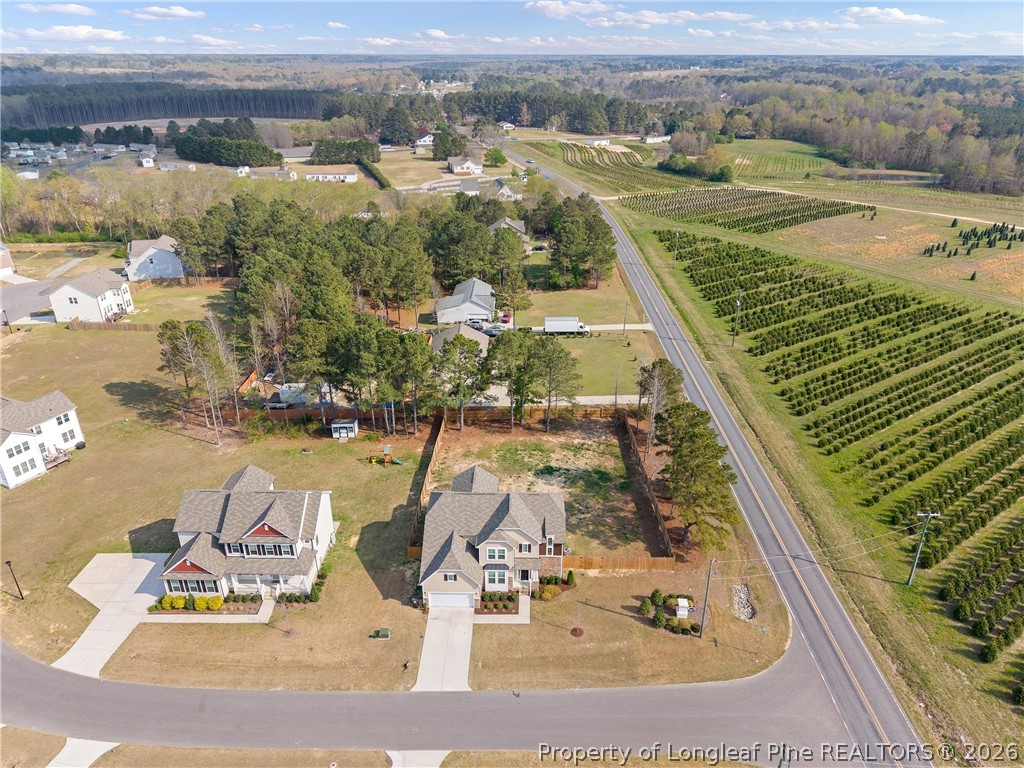 18 Two Belles Court Angier, NC 27501 - Photo 37 of 39 an aerial view of residential houses with outdoor space
