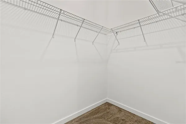 a view of a room with racks on the wall