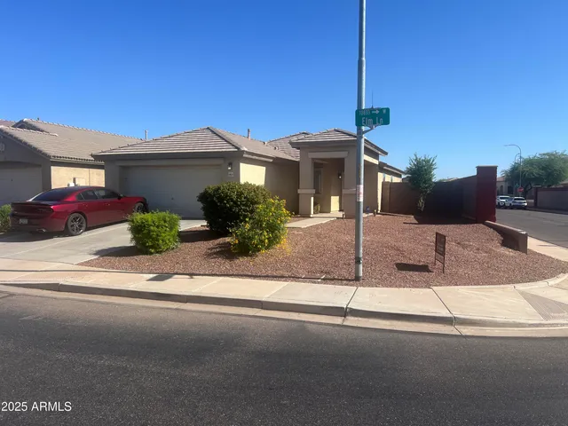 a view of a house with a street
