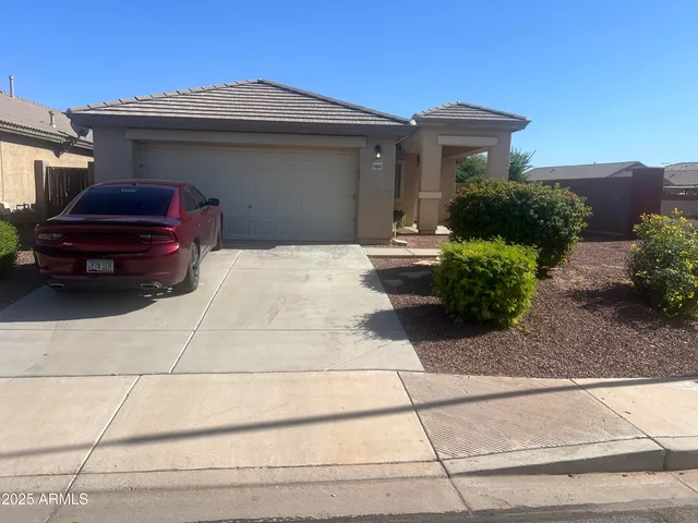 a car parked in front of a house