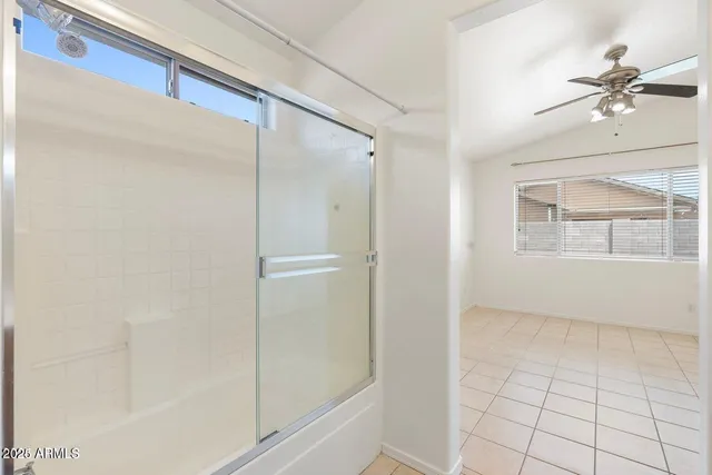 a spacious bathroom with a double vanity sink toilet and a shower