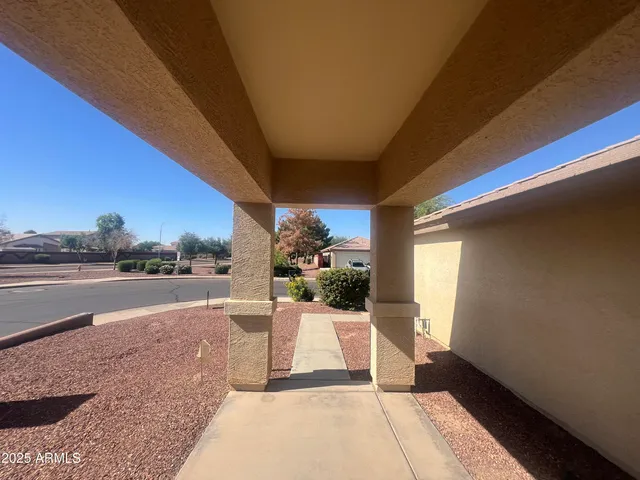 a view of a porch with furniture