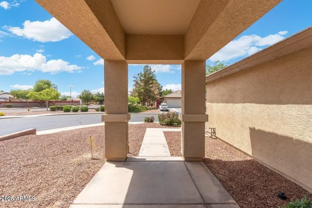 a view of a street with an outdoor space
