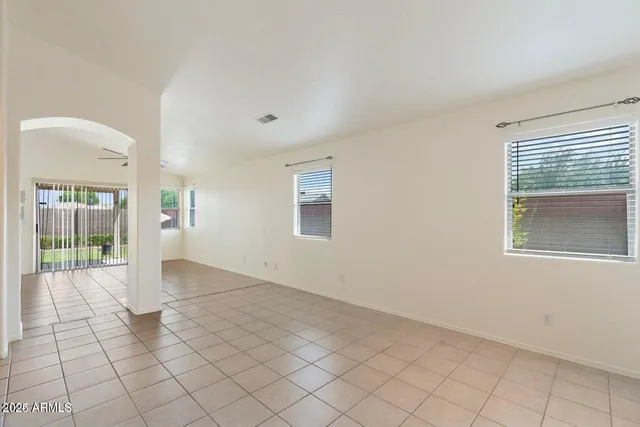 an empty room with windows