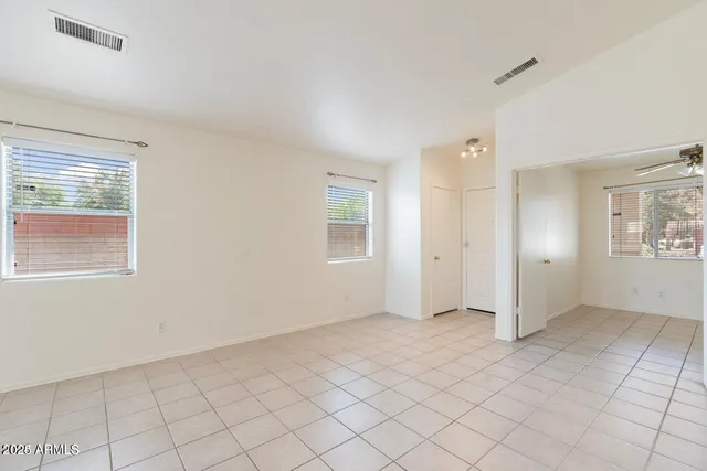 an empty room with windows