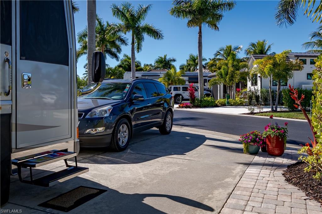 13466 Ladyfish Lane Naples, FL 34114 - Photo 22 of 40 a view of a children toys back of the house