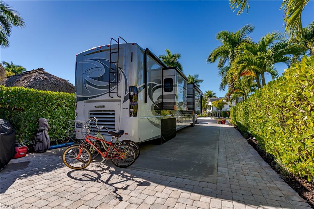 13466 Ladyfish Lane Naples, FL 34114 - Photo 27 of 40 a view of outdoor space and patio