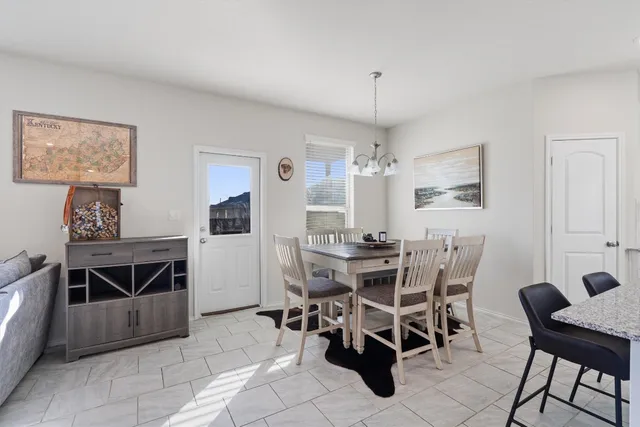 a view of a dining room kitchen and a window
