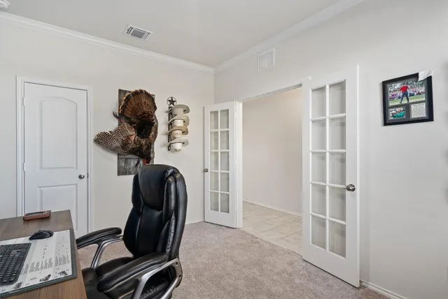 a view of workspace with wooden floor windows