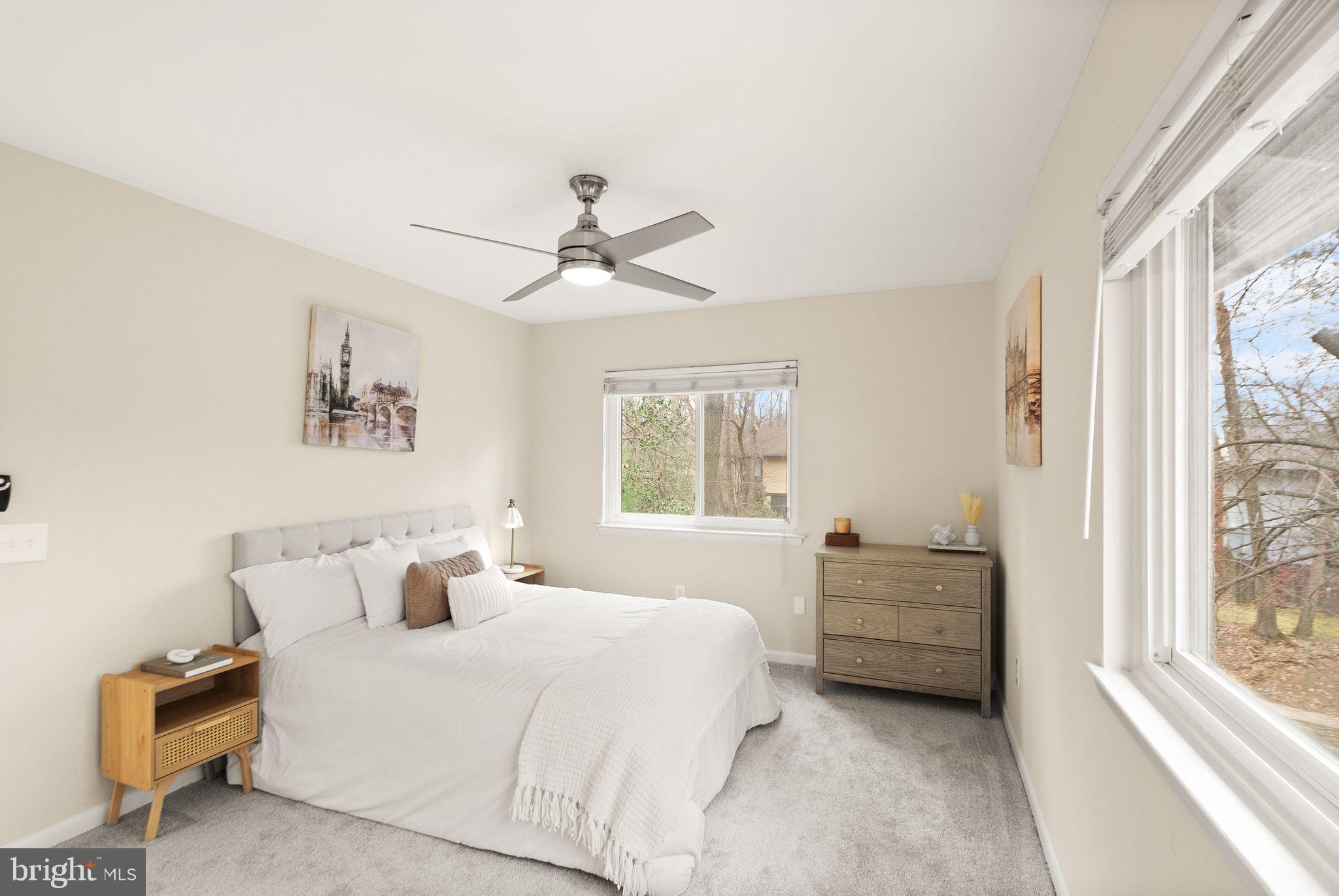 11801 Coopers Court Reston, VA 20191 - Photo 28 of 66 a bedroom with a large bed and a window