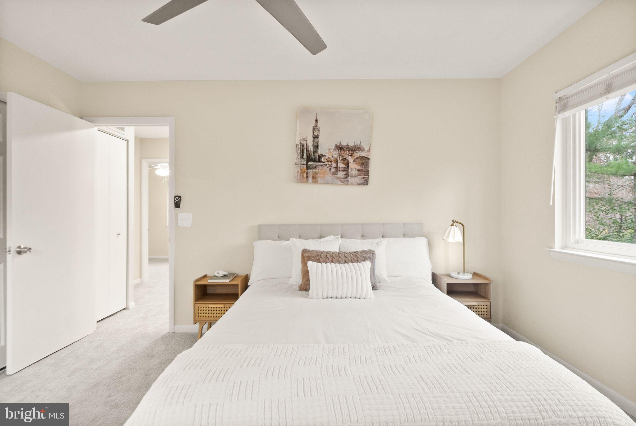 11801 Coopers Court Reston, VA 20191 - Photo 29 of 66 a bedroom with a bed and a window