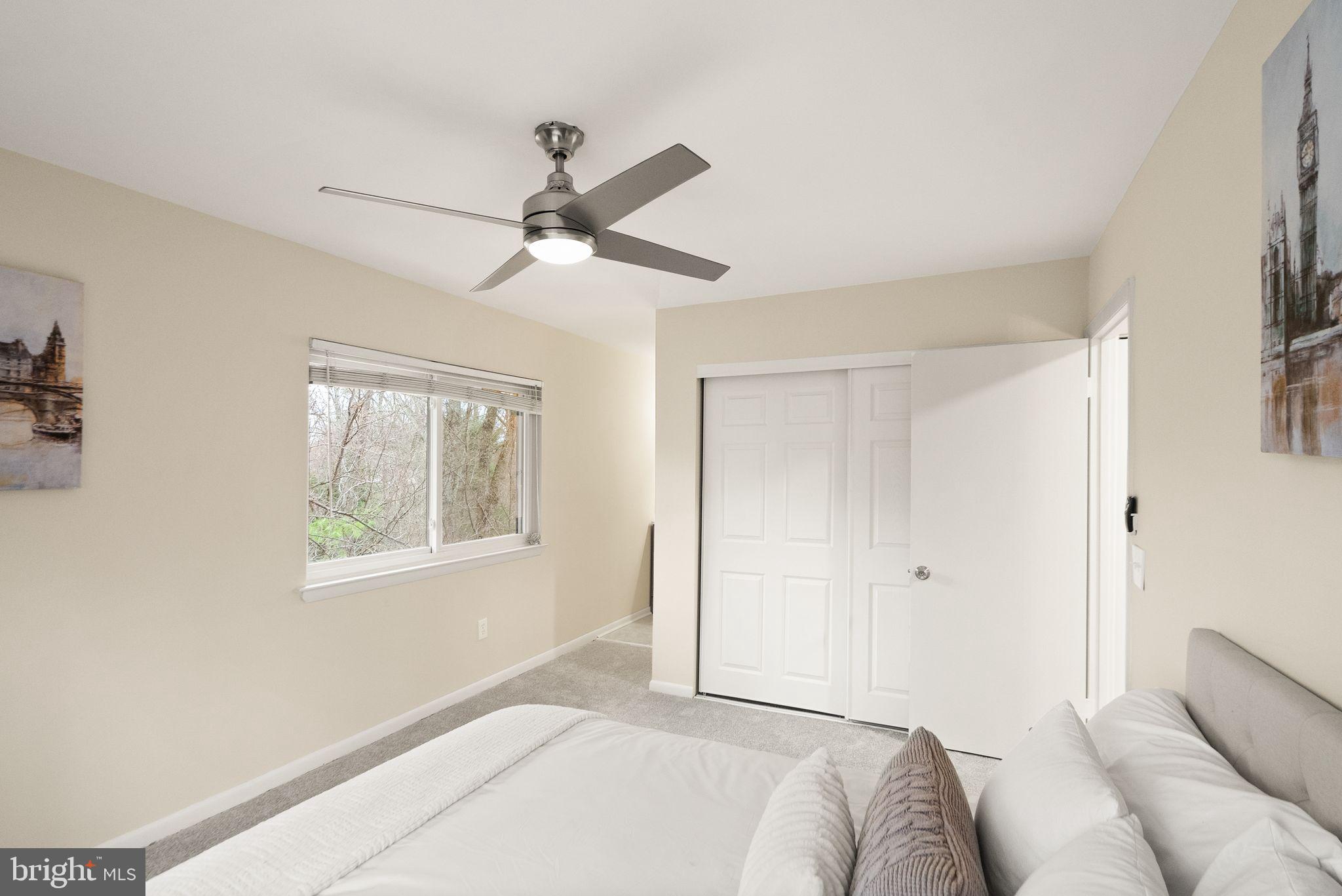 11801 Coopers Court Reston, VA 20191 - Photo 31 of 66 a bedroom with a large bed and a window