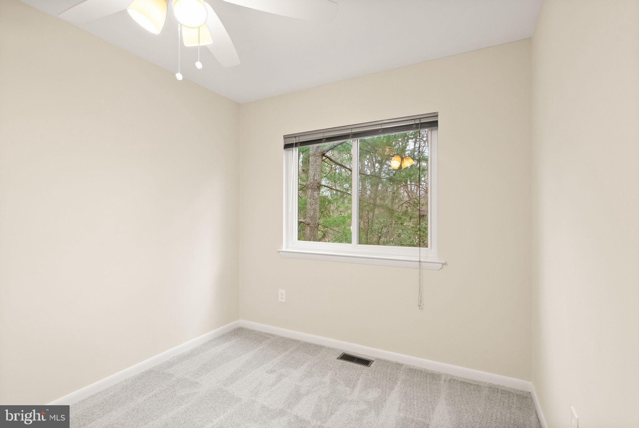 11801 Coopers Court Reston, VA 20191 - Photo 37 of 66 an empty room with a window