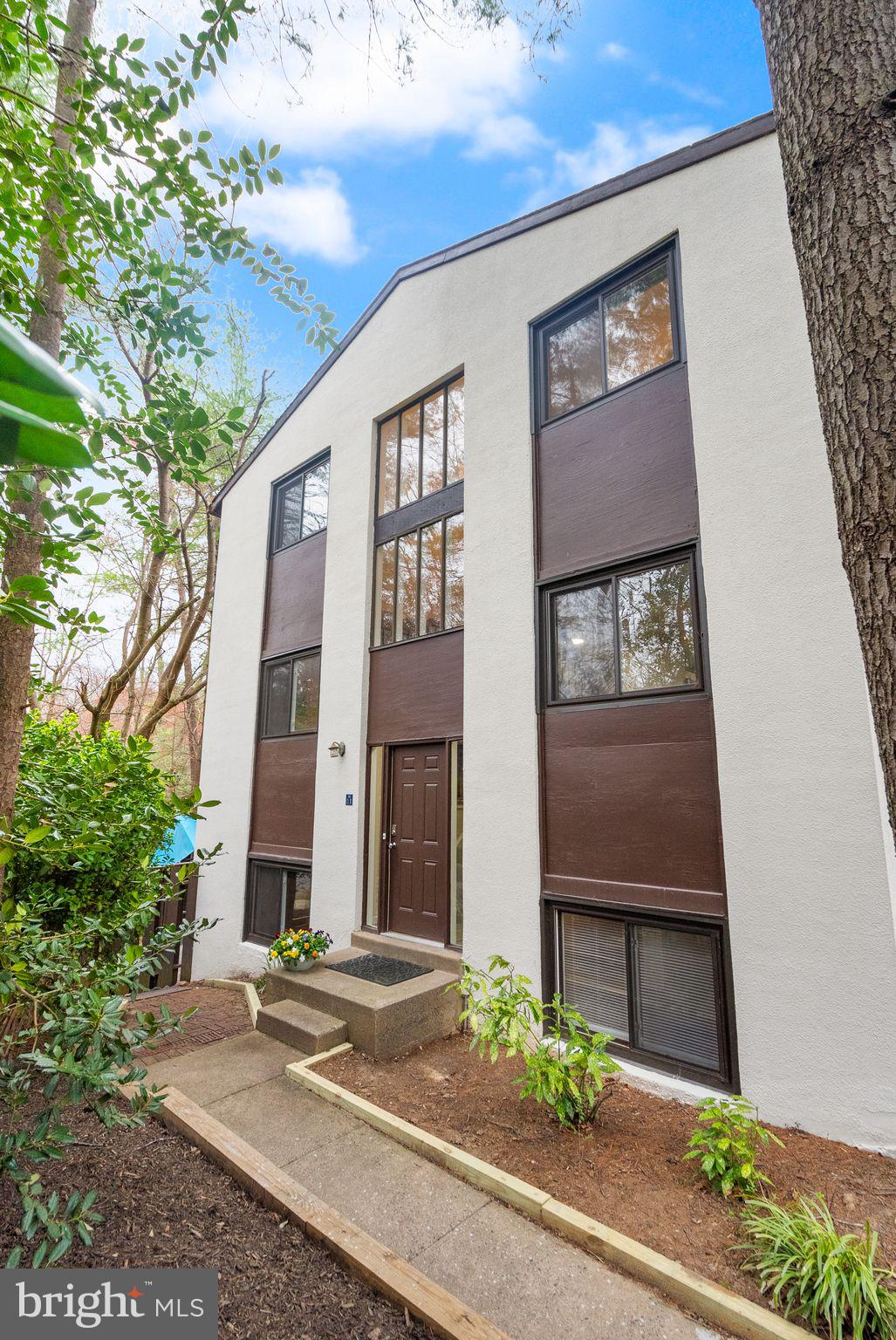 11801 Coopers Court Reston, VA 20191 - Photo 5 of 66 a front view of a house