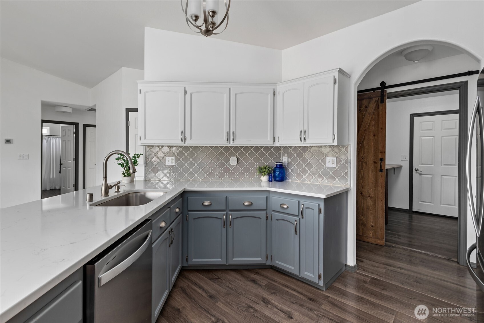 2060 Southwest 16th Avenue Oak Harbor, WA 98277 - Photo 12 of 40 a kitchen with a sink cabinets and stainless steel appliances