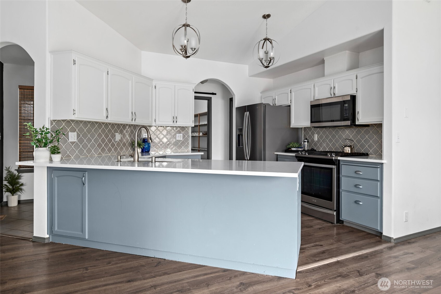 2060 Southwest 16th Avenue Oak Harbor, WA 98277 - Photo 13 of 40 a kitchen with a refrigerator and a stove top oven