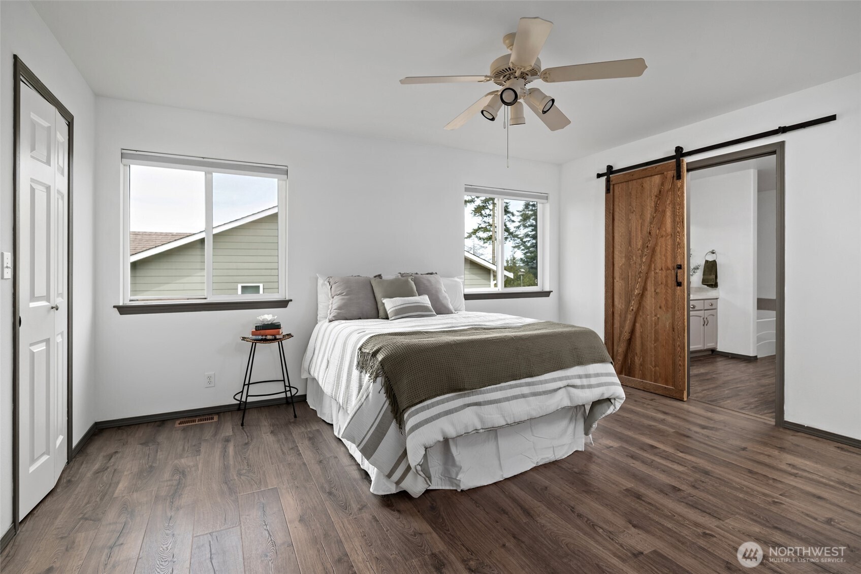 2060 Southwest 16th Avenue Oak Harbor, WA 98277 - Photo 15 of 40 a bedroom with a bed and a window