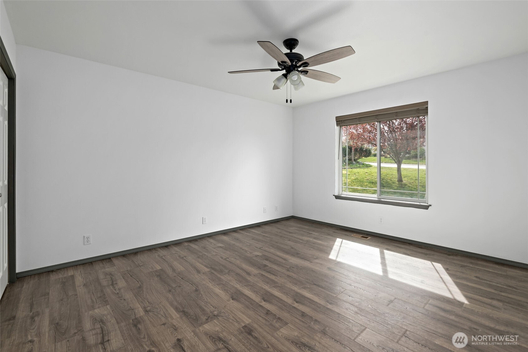 2060 Southwest 16th Avenue Oak Harbor, WA 98277 - Photo 24 of 40 a view of a big room with wooden floor and windows