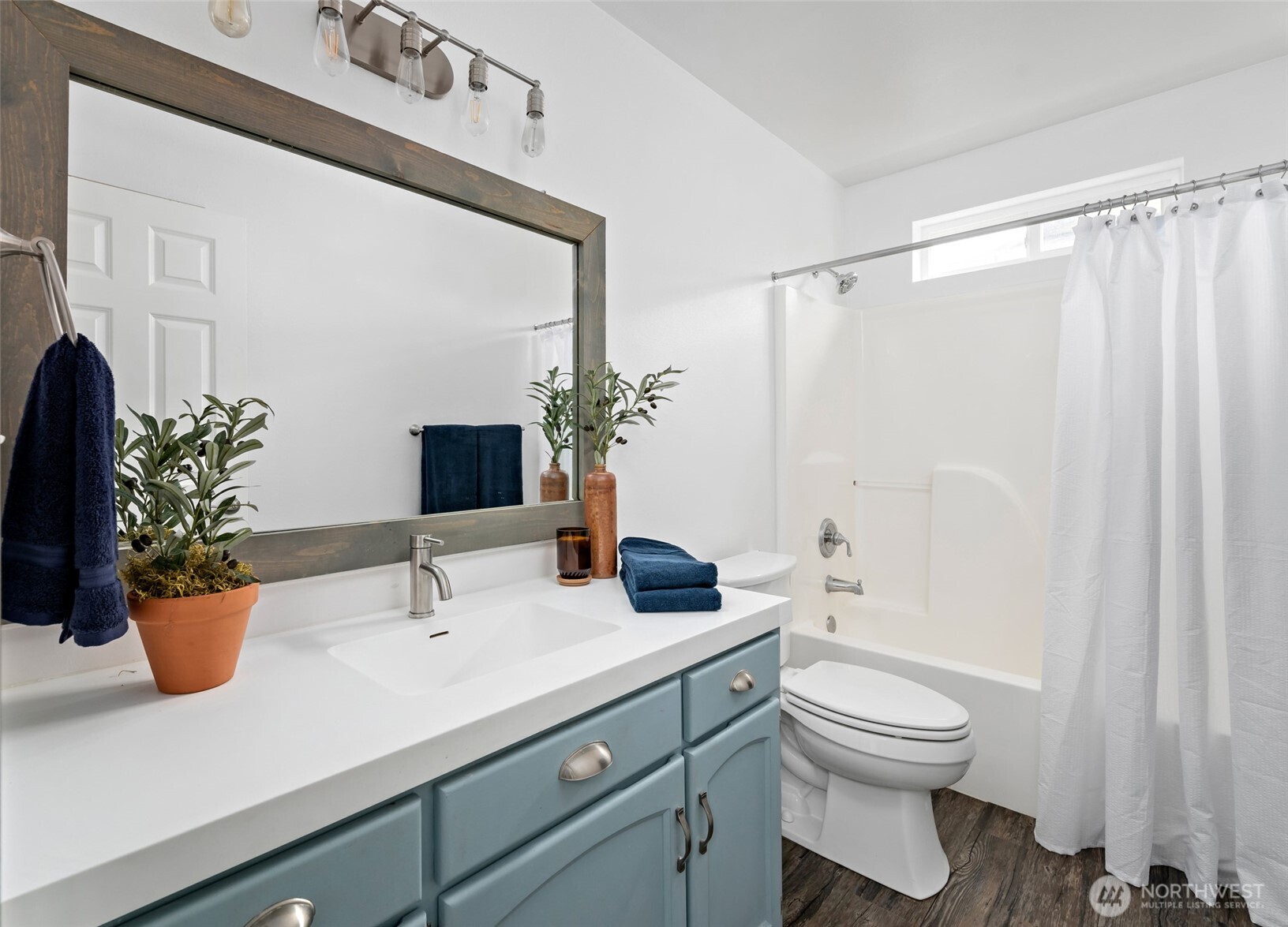 2060 Southwest 16th Avenue Oak Harbor, WA 98277 - Photo 27 of 40 a bathroom with a sink a toilet and shower