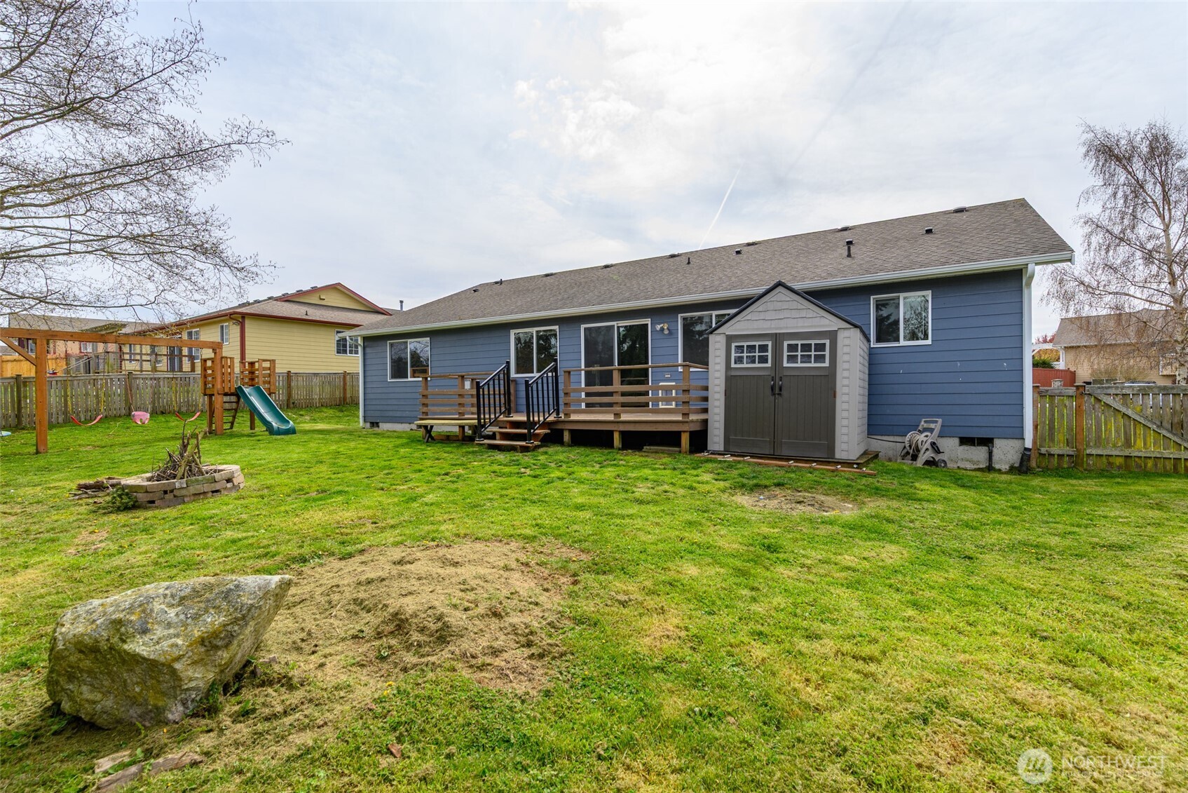 2060 Southwest 16th Avenue Oak Harbor, WA 98277 - Photo 34 of 40 a view of a house with a backyard